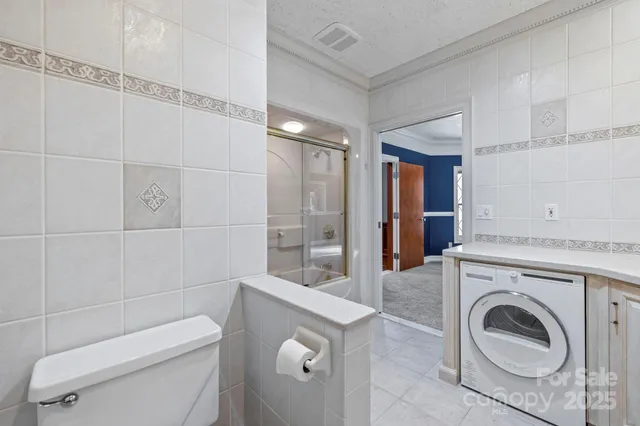 a view of balcony with wooden floor and fence
