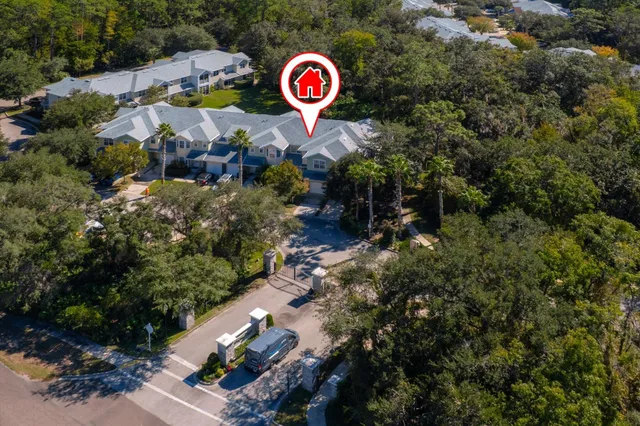 a view of a street with lots of trees