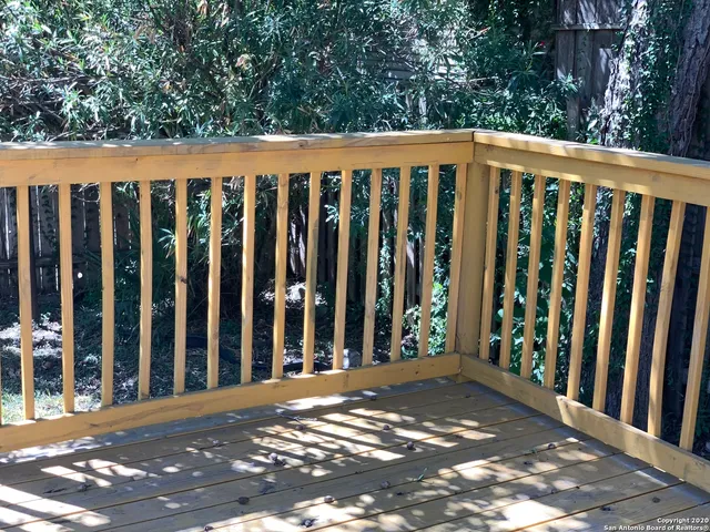 a view of a wooden fence