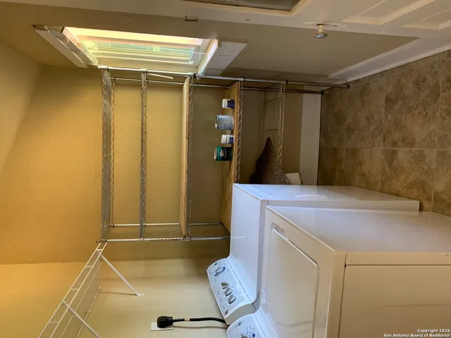 a bathroom with a sink and toilet