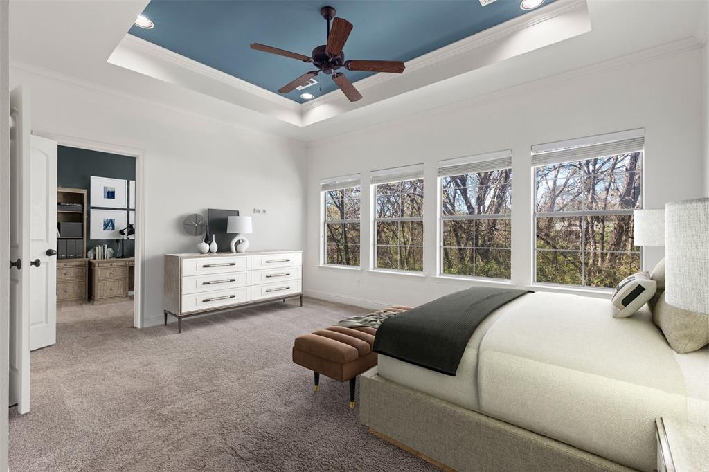 8813 Tudor Place Dallas, TX 75228 - Photo 13 of 27 a large white bed sitting in a living room next to a window