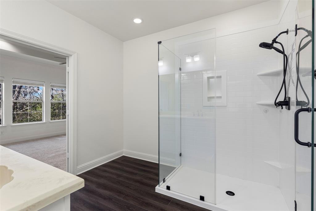 8813 Tudor Place Dallas, TX 75228 - Photo 14 of 27 a bathroom with a shower