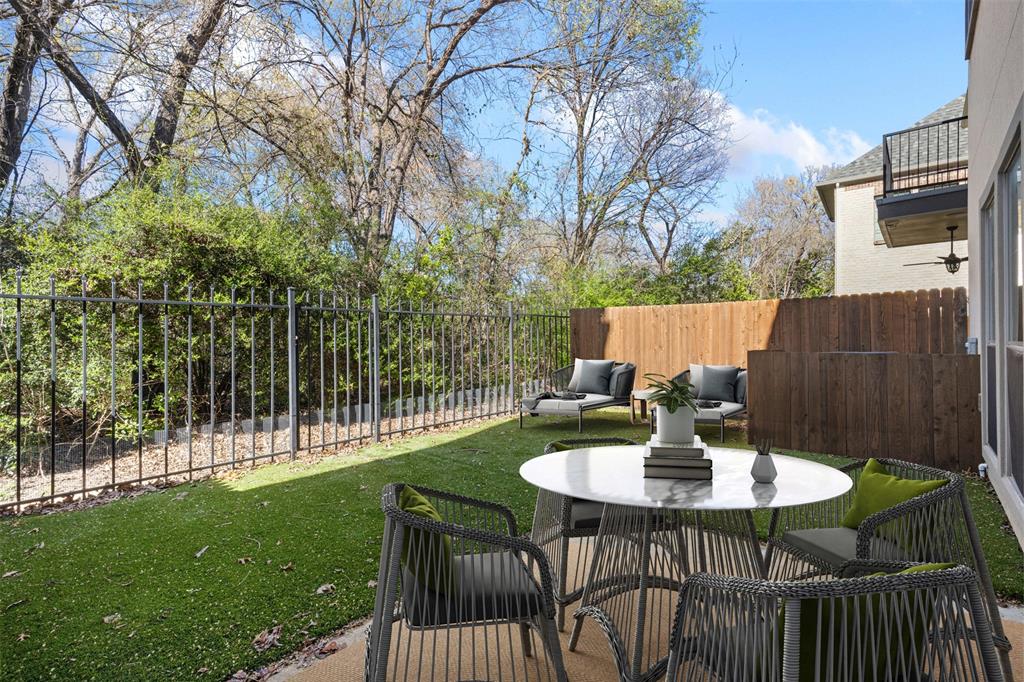 8813 Tudor Place Dallas, TX 75228 - Photo 2 of 27 a view of a table and chairs in the patio