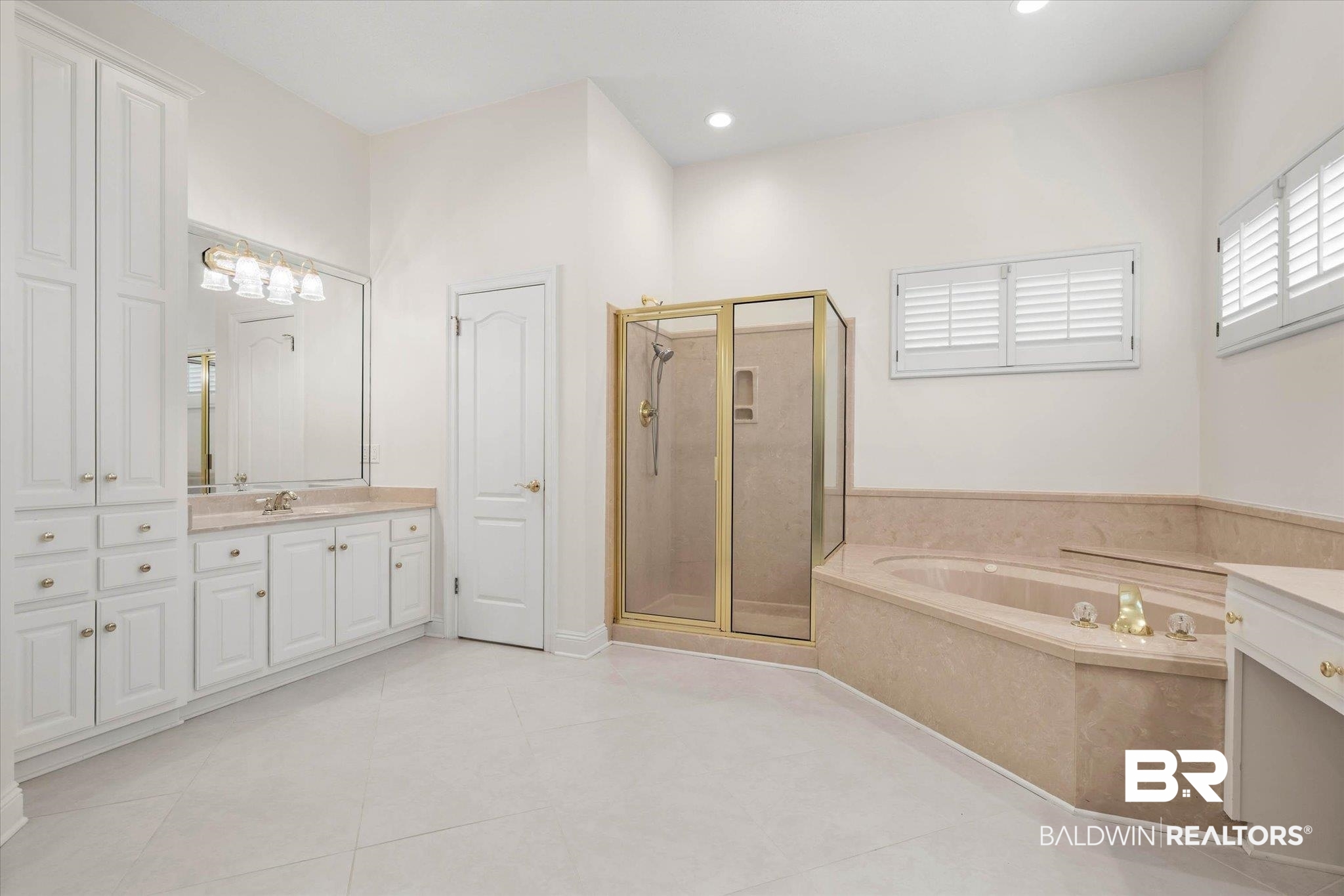 1083 Southern Way Court Mobile, AL 36609 - Photo 20 of 31 Bathroom featuring vanity, a shower stall, a garden tub, and light tile patterned flooring
