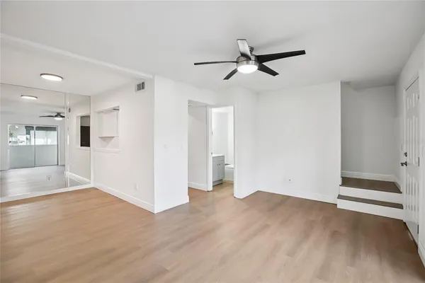 a kitchen with a stove and a refrigerator