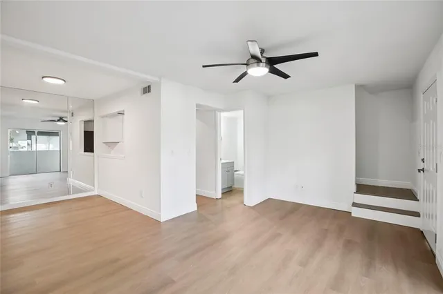 a kitchen with a stove and a refrigerator