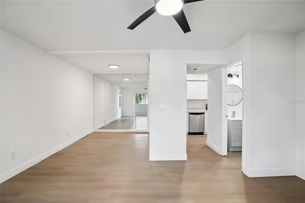 a kitchen with a stove microwave and sink