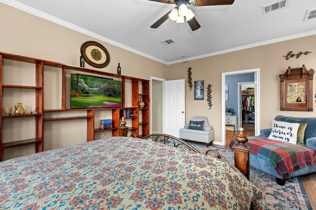 a bathroom with a double vanity sink toilet and a mirror
