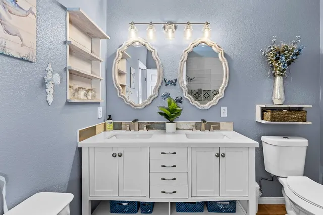 an aerial view of a house with a garden