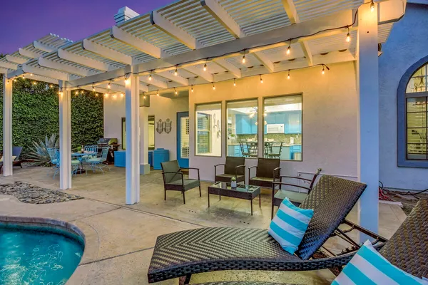 a view of a backyard with a patio