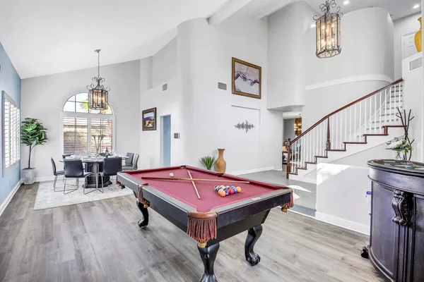a very nice looking living room with a dining table