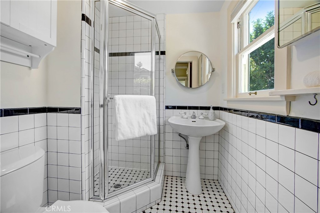 1632 Fletcher Avenue South Pasadena, CA 91030 - Photo 15 of 25 a bathroom with a sink a toilet and shower