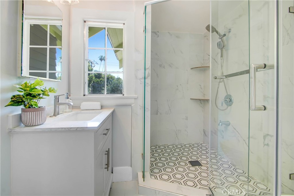 1632 Fletcher Avenue South Pasadena, CA 91030 - Photo 18 of 25 a bathroom with a shower and a sink