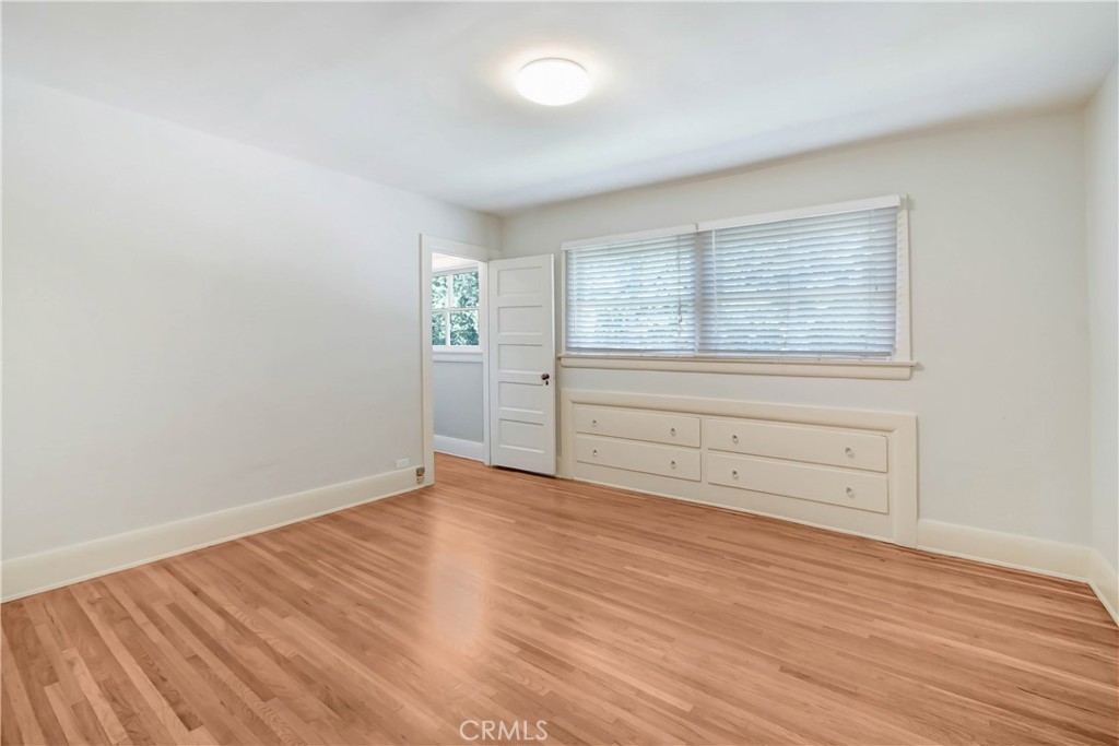 1632 Fletcher Avenue South Pasadena, CA 91030 - Photo 19 of 25 wooden floor in an empty room with a window