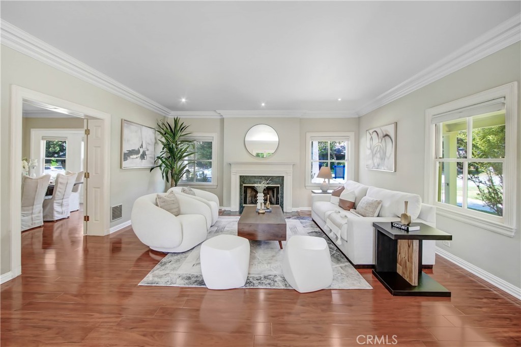 1632 Fletcher Avenue South Pasadena, CA 91030 - Photo 6 of 25 a living room with fireplace furniture and a wooden floor