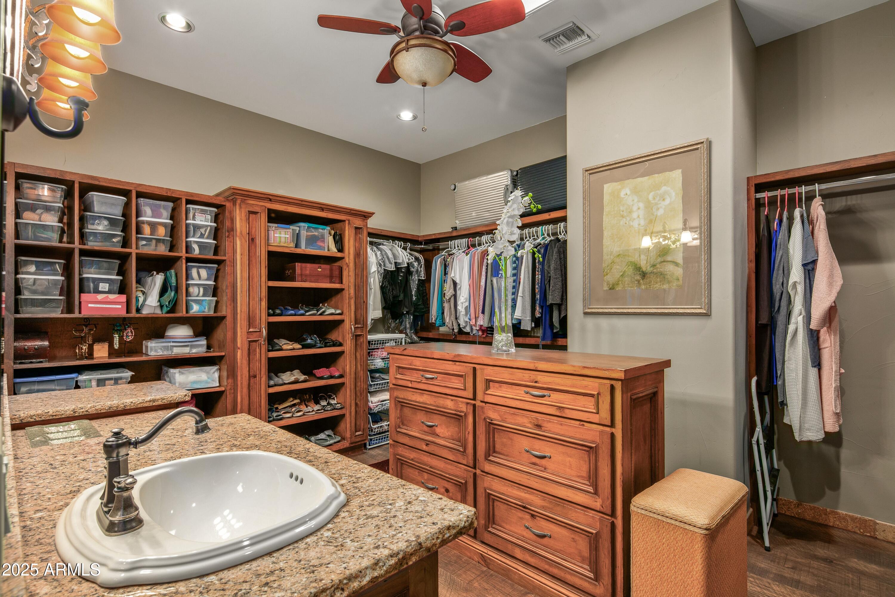9533 East Rising Sun Drive Scottsdale, AZ 85262 - Photo 23 of 46 a bathroom with a sink a toilet and a bathtub