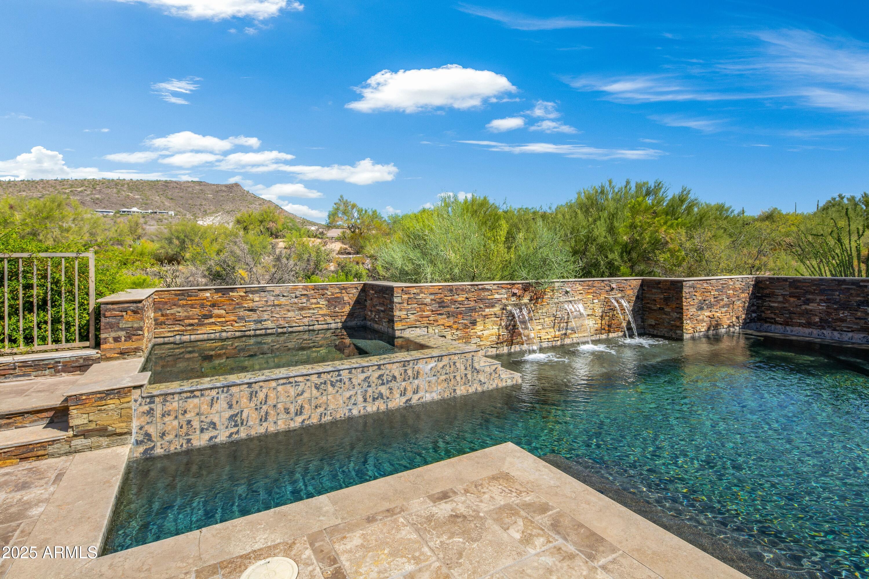 9533 East Rising Sun Drive Scottsdale, AZ 85262 - Photo 40 of 46 a view of a lake with a yard