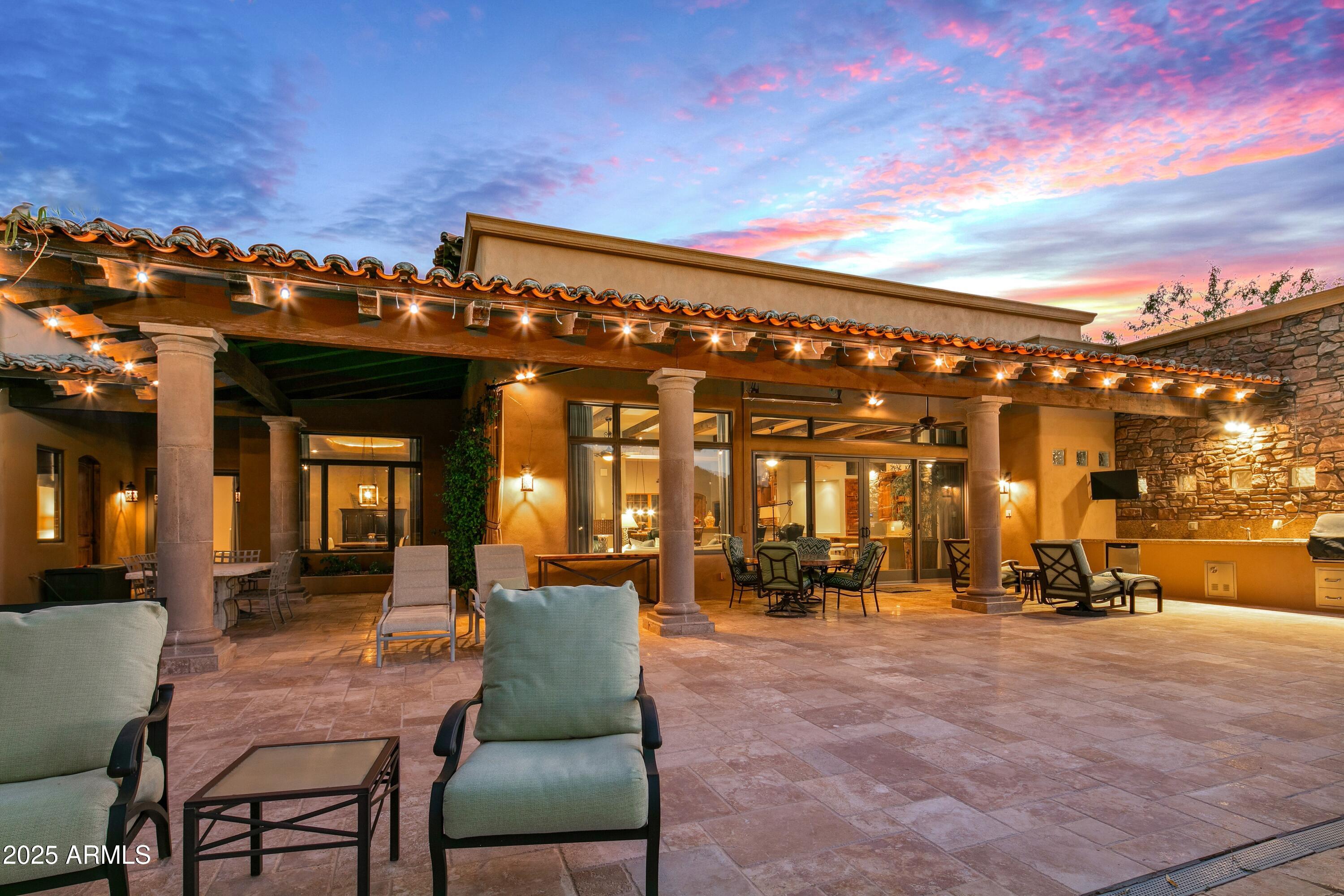 9533 East Rising Sun Drive Scottsdale, AZ 85262 - Photo 42 of 46 a view of a chairs and tables in the patio
