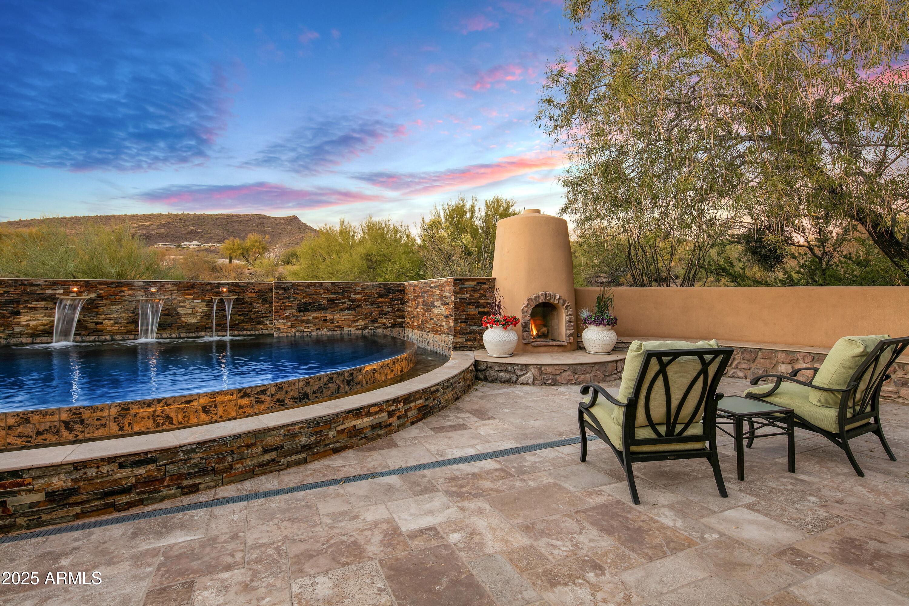 9533 East Rising Sun Drive Scottsdale, AZ 85262 - Photo 44 of 46 a view of a terrace with seating area