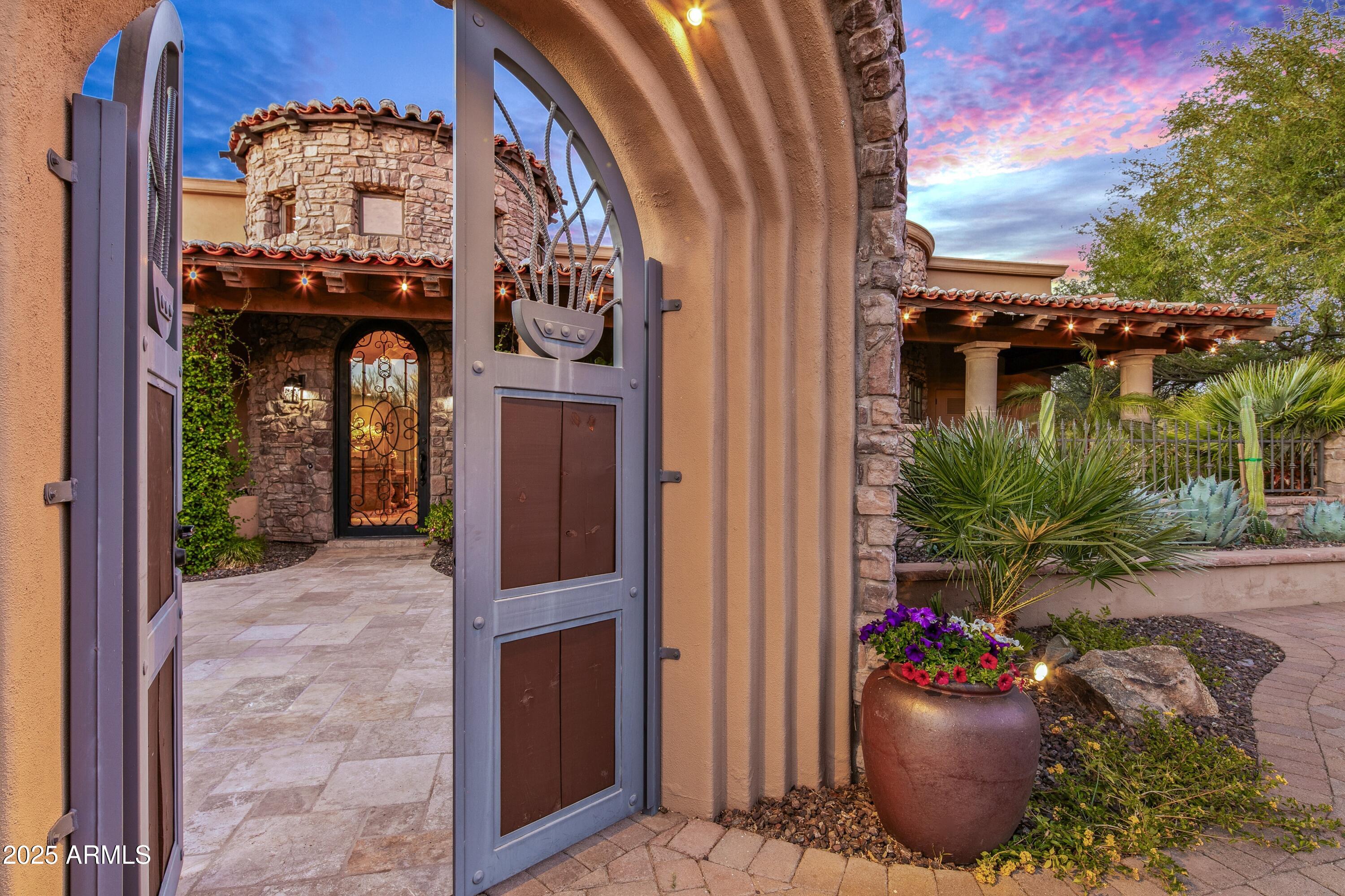9533 East Rising Sun Drive Scottsdale, AZ 85262 - Photo 6 of 46 a view of a entryway door front of house