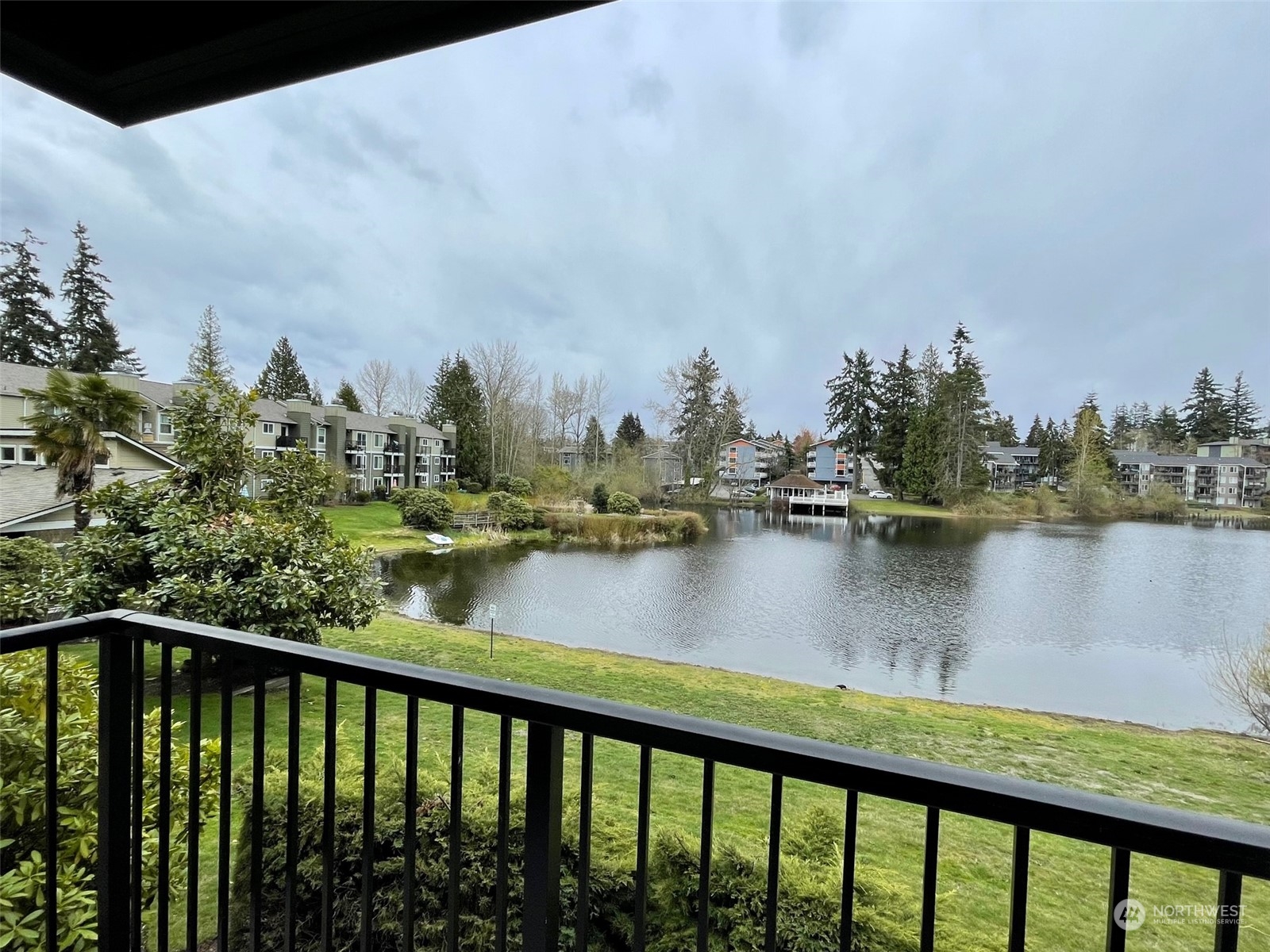 820 Cady Road, Unit E205 Everett, WA 98203 - Photo 8 of 28 a view of a lake from a balcony