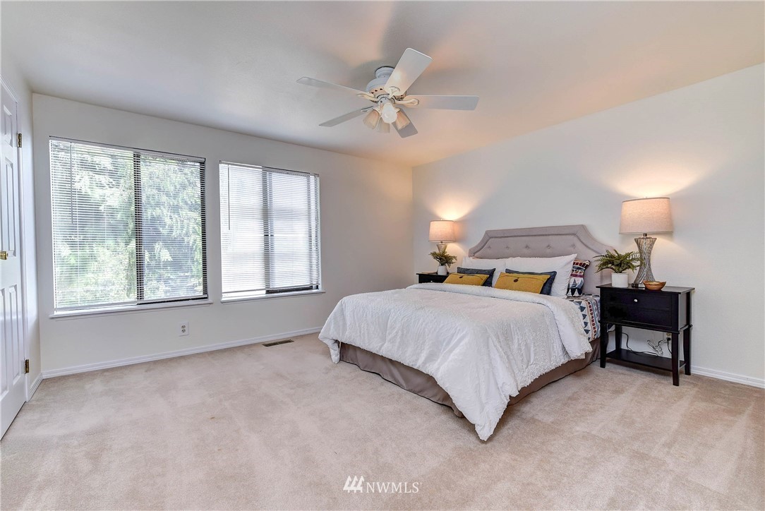 22708 3rd Avenue Southeast Bothell, WA 98021 - Photo 2 of 26 a bedroom with a bed and a window