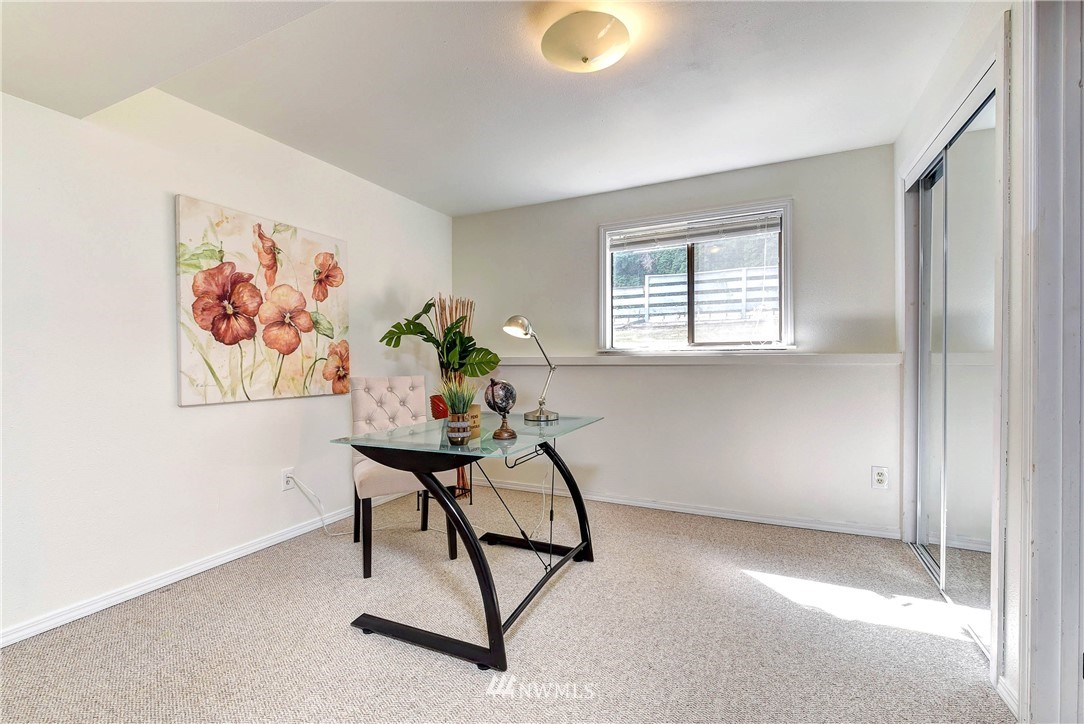 22708 3rd Avenue Southeast Bothell, WA 98021 - Photo 18 of 26 a view of a workspace with furniture and a window