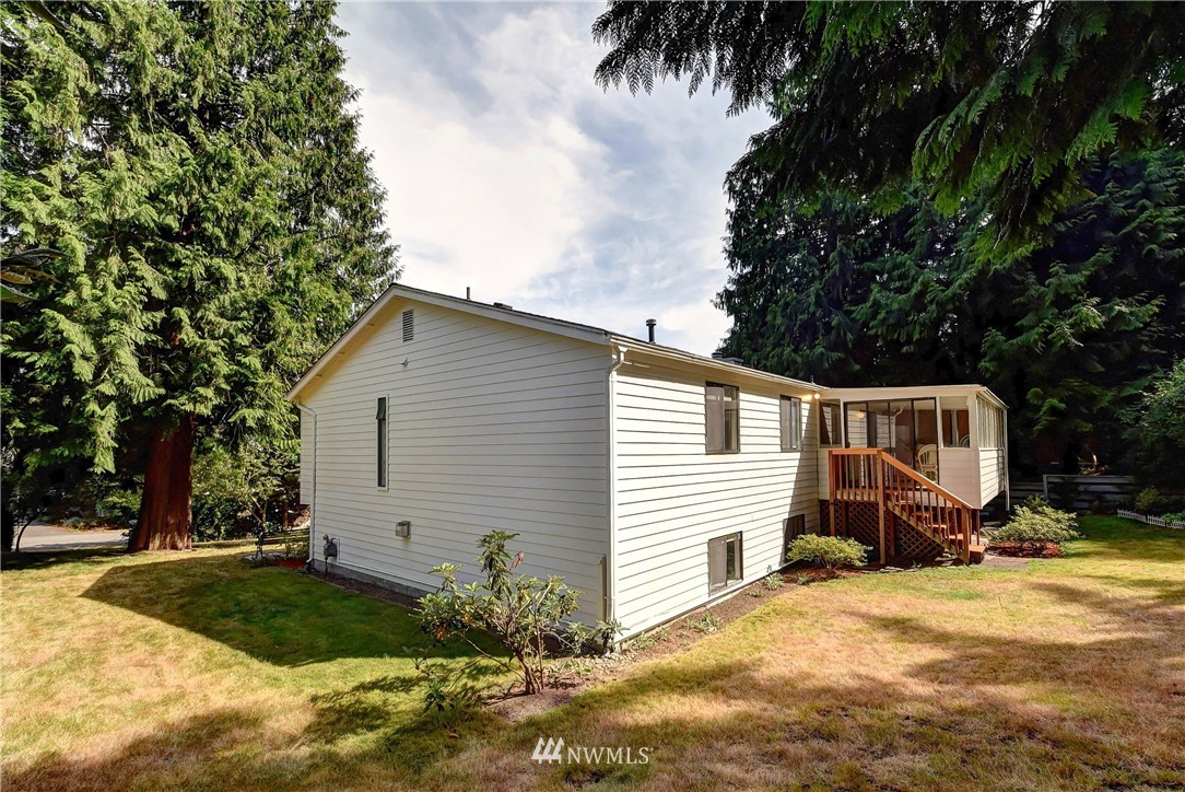 22708 3rd Avenue Southeast Bothell, WA 98021 - Photo 23 of 26 a view of a house with backyard and trees