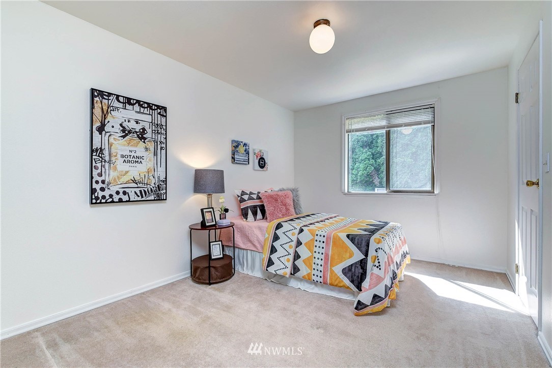22708 3rd Avenue Southeast Bothell, WA 98021 - Photo 5 of 26 a bedroom with bed and a window