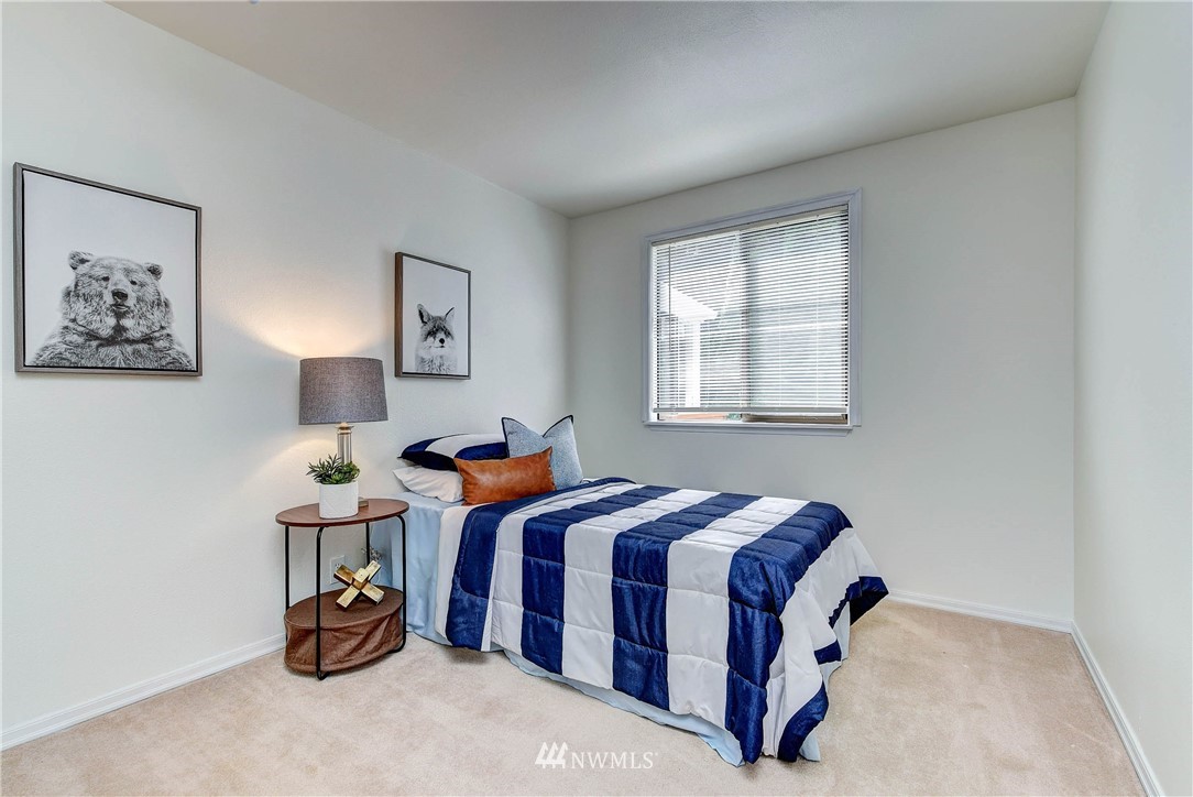 22708 3rd Avenue Southeast Bothell, WA 98021 - Photo 7 of 26 a bedroom with a bed and a window