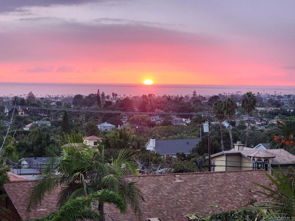 1780 Laurel Road Oceanside, CA 92054 - Photo 1 of 46 a view of a lake with a city