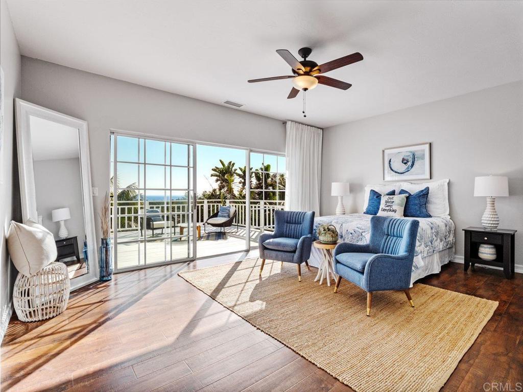 1780 Laurel Road Oceanside, CA 92054 - Photo 13 of 46 a living room with furniture and a floor to ceiling window
