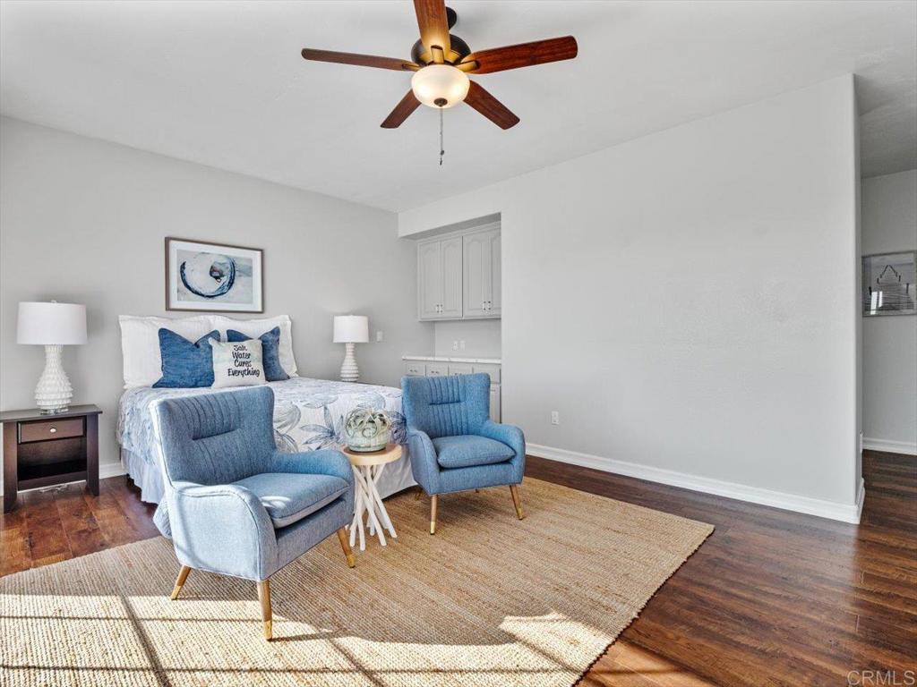1780 Laurel Road Oceanside, CA 92054 - Photo 15 of 46 a living room with furniture and a rug