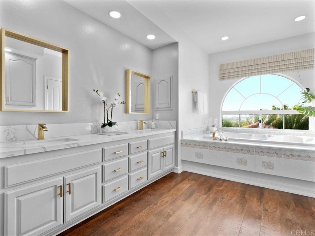 1780 Laurel Road Oceanside, CA 92054 - Photo 17 of 46 a spacious bathroom with a granite countertop sink mirror and