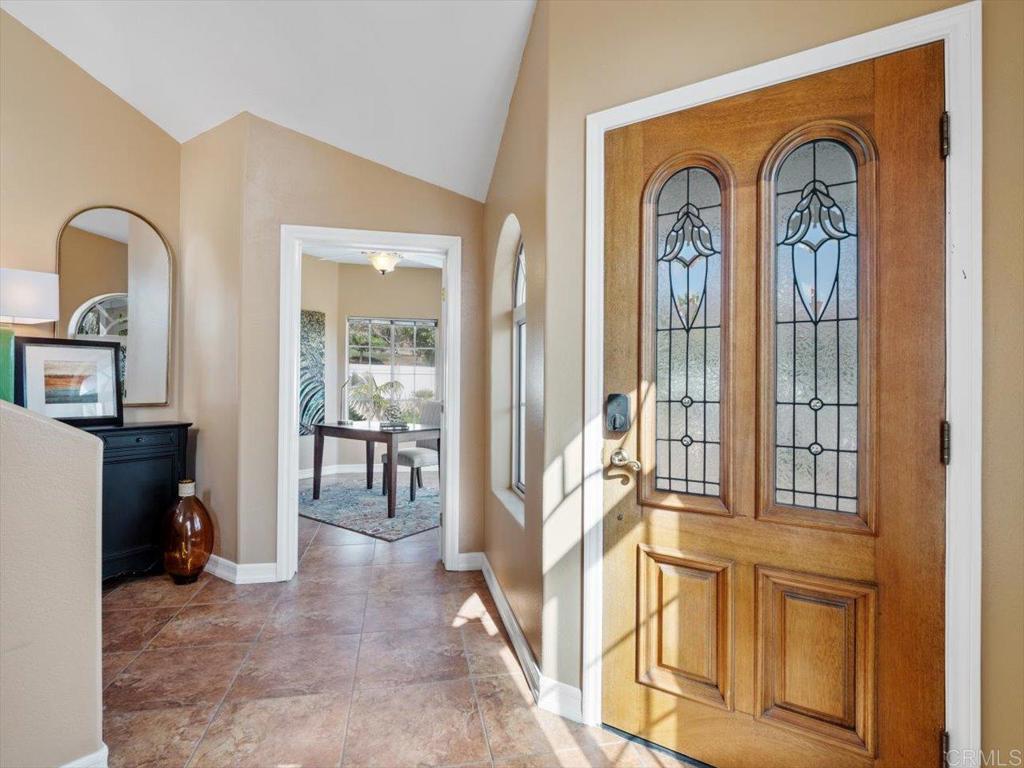 1780 Laurel Road Oceanside, CA 92054 - Photo 25 of 46 a view of an entryway with wooden floor and a livingroom