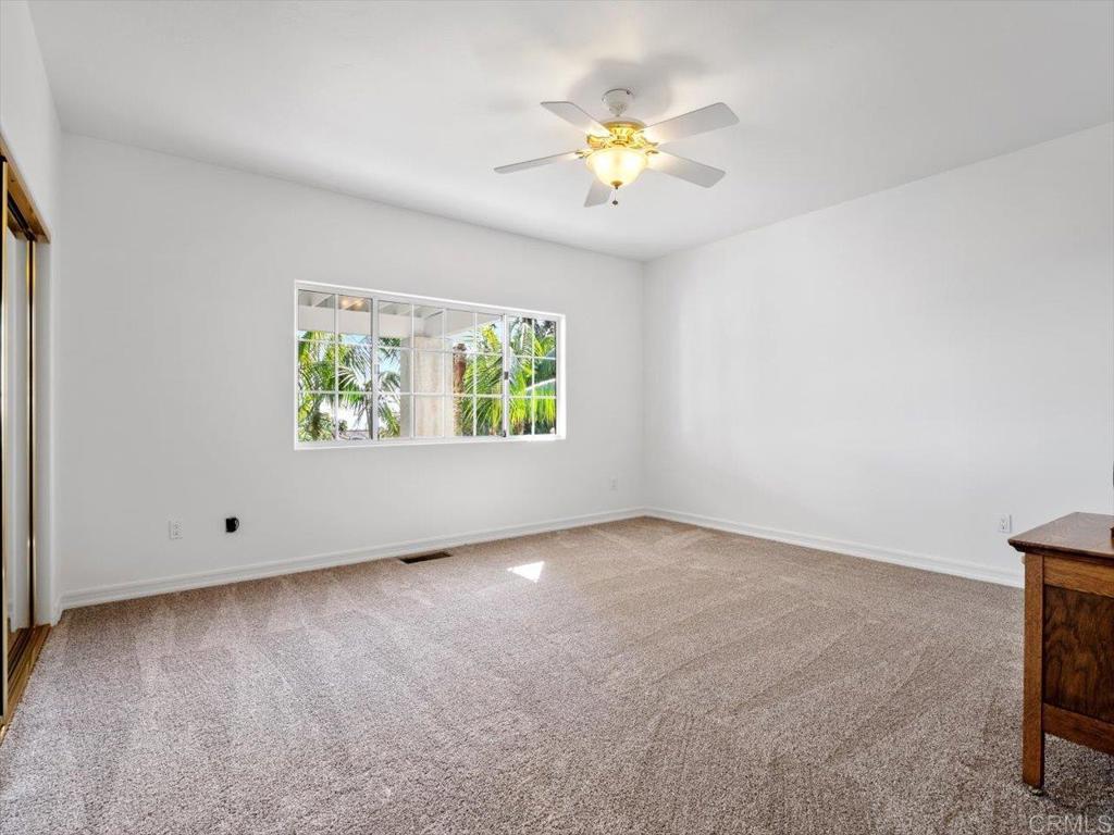 1780 Laurel Road Oceanside, CA 92054 - Photo 31 of 46 an empty room with a window