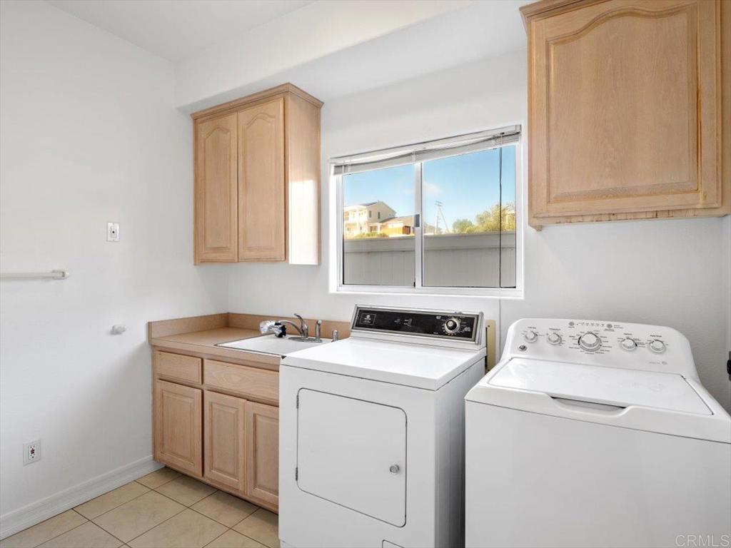 1780 Laurel Road Oceanside, CA 92054 - Photo 35 of 46 a utility room with dryer and washer