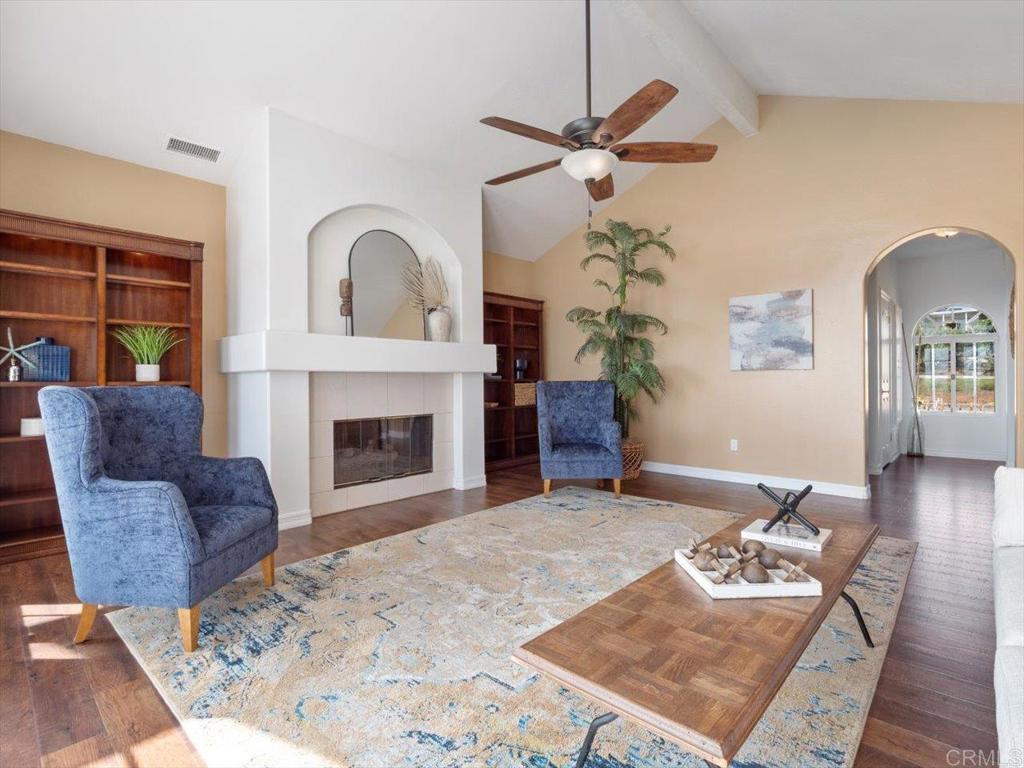 1780 Laurel Road Oceanside, CA 92054 - Photo 7 of 46 a living room with furniture and a fireplace