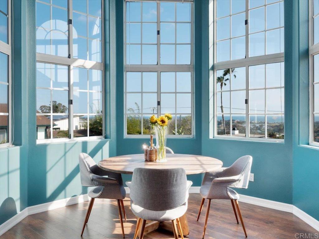 1780 Laurel Road Oceanside, CA 92054 - Photo 8 of 46 a dining room with furniture and wooden floor