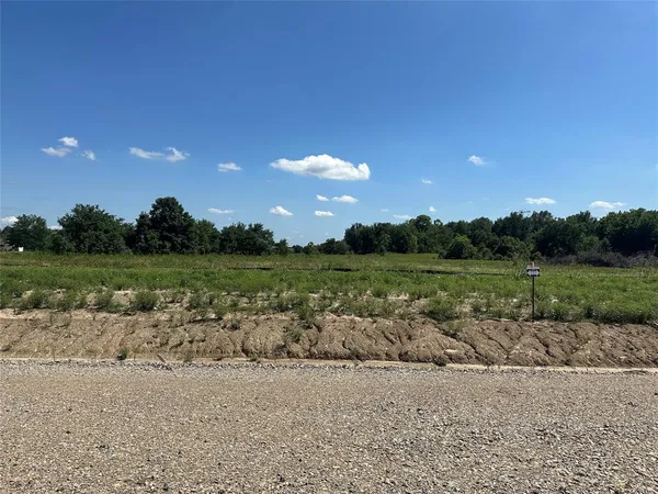 a view of a lake with outdoor space