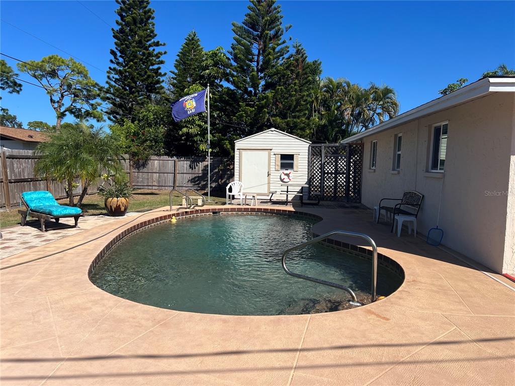 1228 Nantucket Road Venice, FL 34293 - Photo 13 of 32 a view of a house with swimming pool
