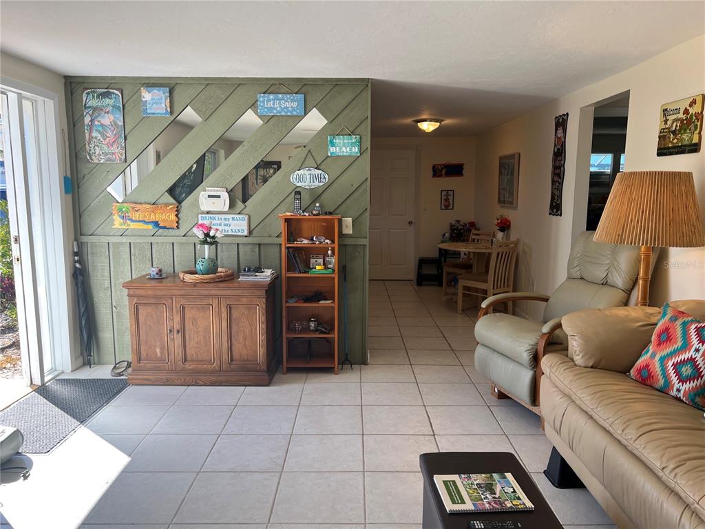 1228 Nantucket Road Venice, FL 34293 - Photo 20 of 32 a living room with furniture and a window
