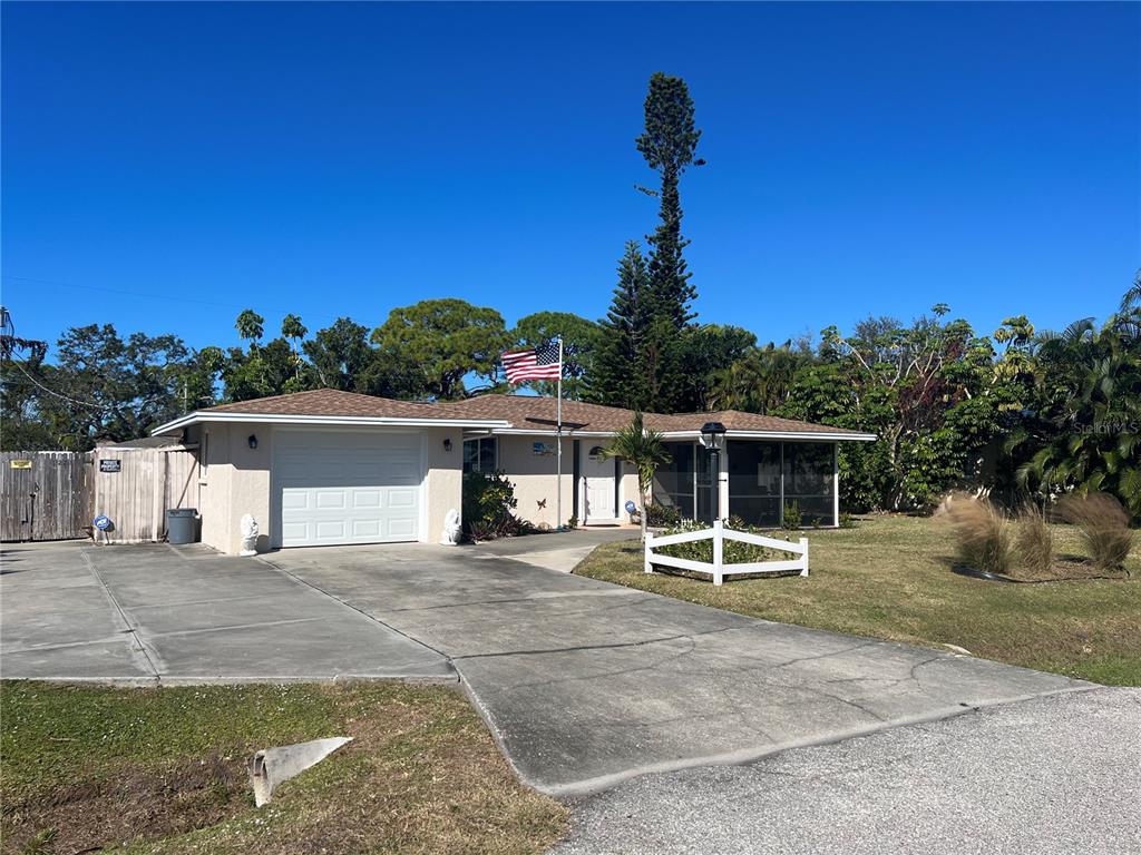 1228 Nantucket Road Venice, FL 34293 - Photo 3 of 32 a view of a house with a patio