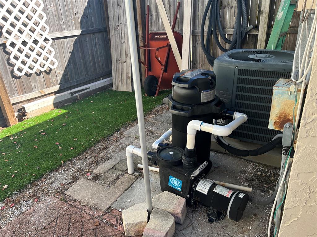 1228 Nantucket Road Venice, FL 34293 - Photo 31 of 32 a backyard of a house with seating space