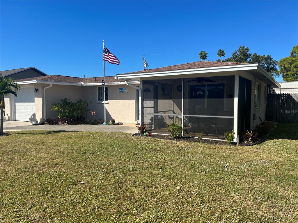 1228 Nantucket Road Venice, FL 34293 - Photo 4 of 32 a view of a house with backyard and porch