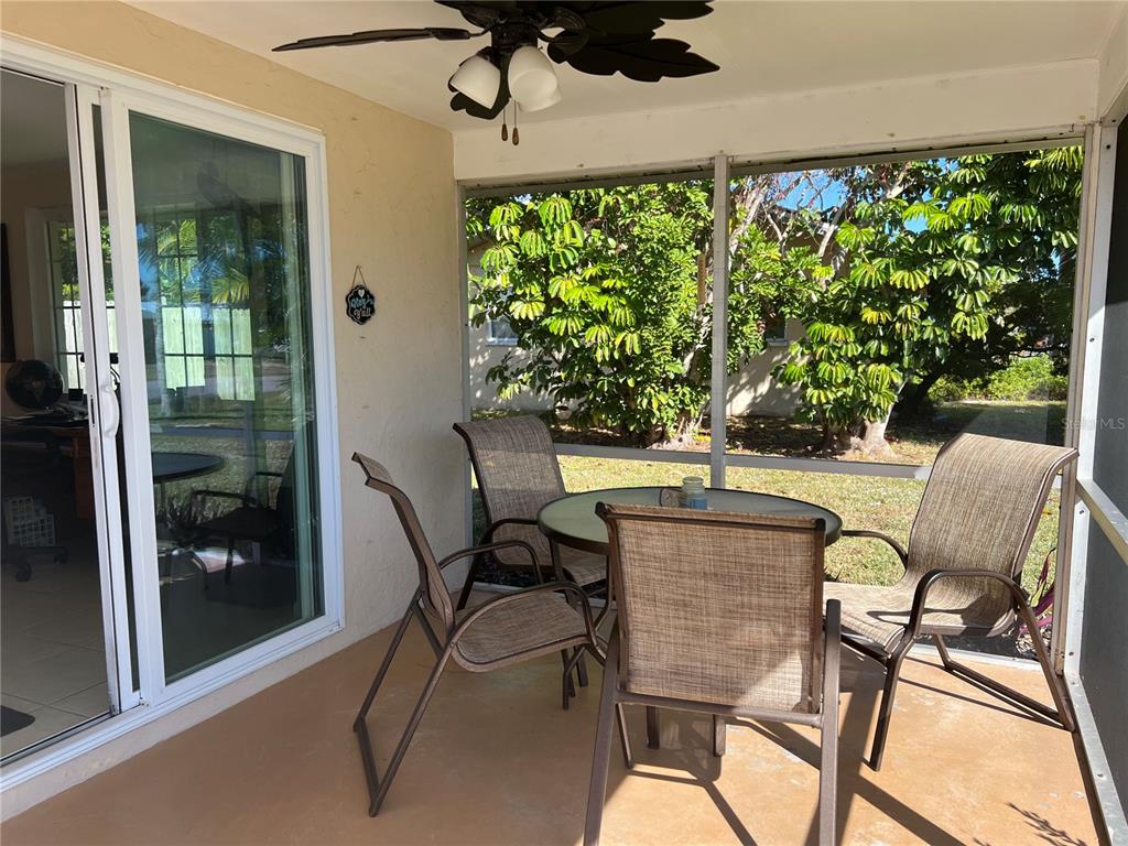 1228 Nantucket Road Venice, FL 34293 - Photo 6 of 32 a view of a chairs and table in patio