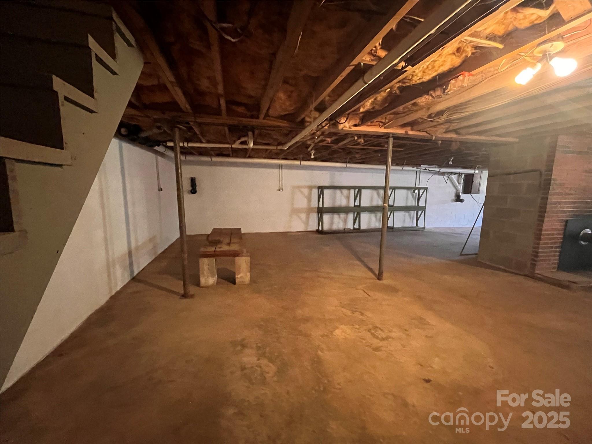 541 Romine Drive Marion, NC 28752 - Photo 14 of 23 a view of a empty room with storage