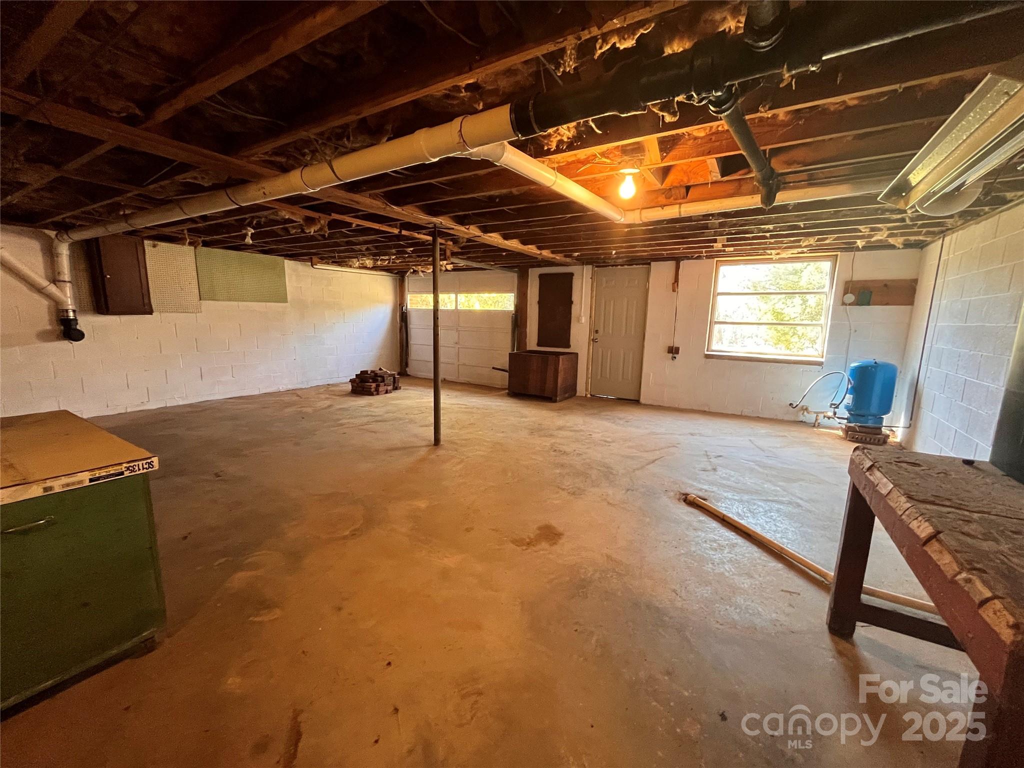 541 Romine Drive Marion, NC 28752 - Photo 19 of 23 a view of a room with gym equipment
