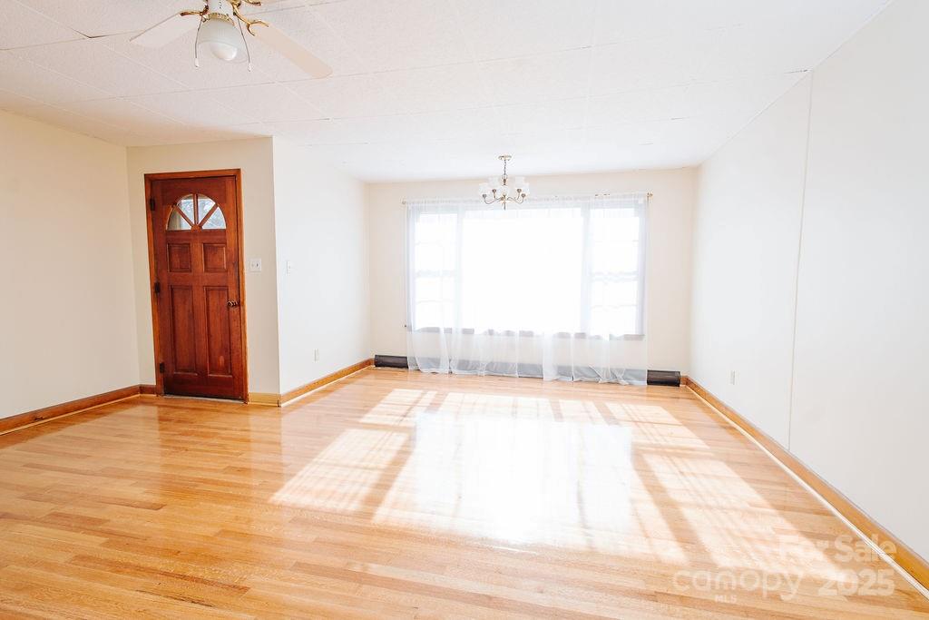541 Romine Drive Marion, NC 28752 - Photo 2 of 23 a view of an empty room with a window