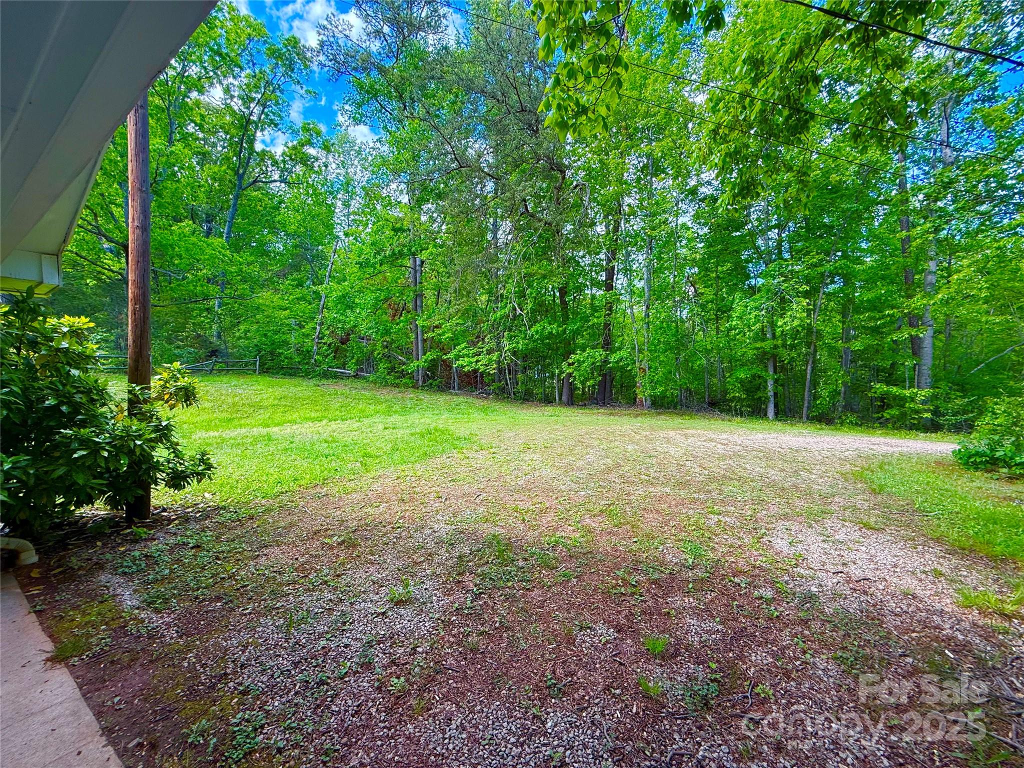541 Romine Drive Marion, NC 28752 - Photo 22 of 23 a view of a field with trees in the background